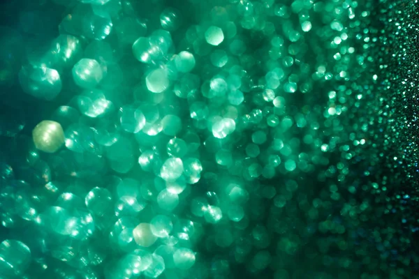 Emerald defocused lights bokeh background. — Stock Photo, Image