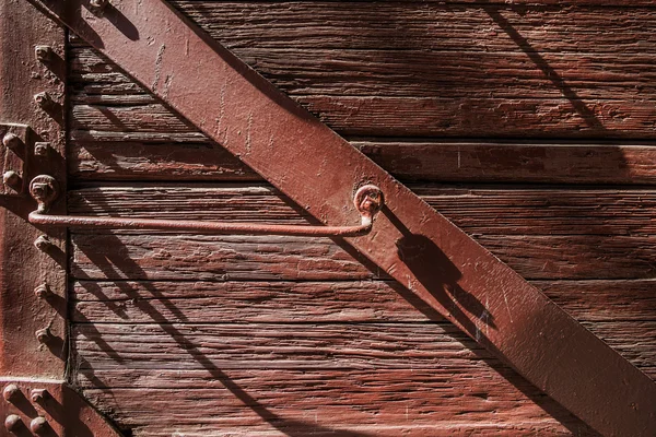 Dřevěná konstrukce prkna zdí starých historických pozadí. Staré dřevěné dveře pozadí — Stock fotografie