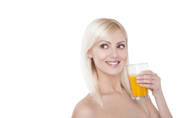 Young woman with glass of orange juice. Female model happy smile. — Stock Photo, Image