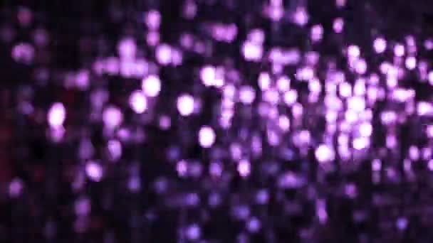 Lentejuelas violeta brillante reflectante fondo . — Vídeos de Stock