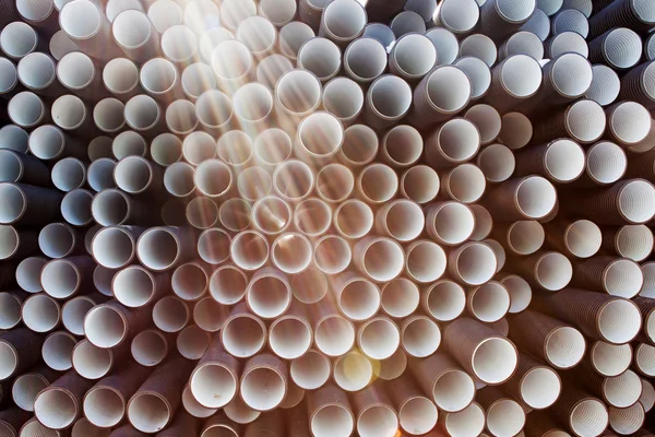 Háttérben a műanyag csövek — Stock Fotó