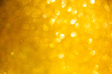 Altın glitter Noel arka plan. Parlak altın ışıkları