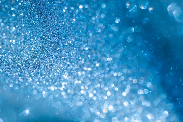 Abstraktes blaues Licht Bokeh als weihnachtlicher Hintergrund — Stockfoto