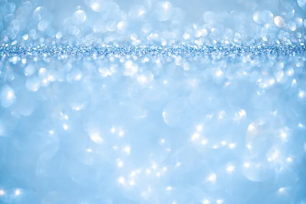Bleu lumières déconcentrées fond de Noël enneigé — Photo