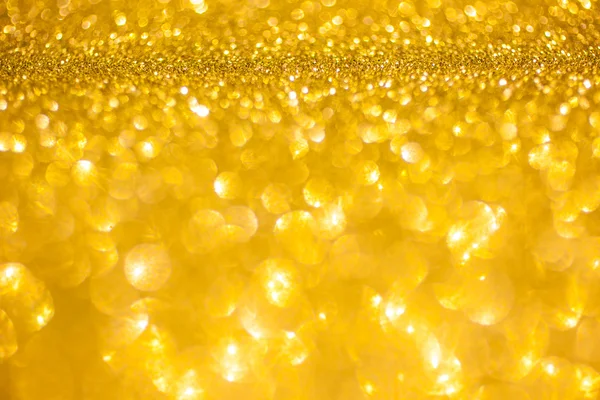 Golden glitter christmas abstract background. Shiny golden lights — Stock Photo, Image