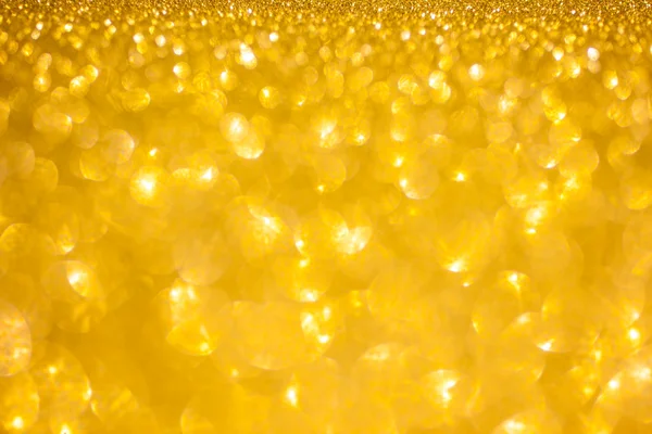 Golden glitter christmas abstract background. Shiny golden lights — Stock Photo, Image