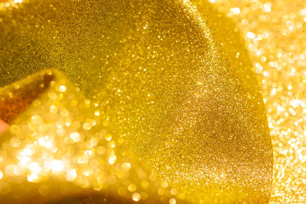 Goldener Glanz Weihnachten abstrakten Hintergrund. Goldglänzende Lichter — Stockfoto