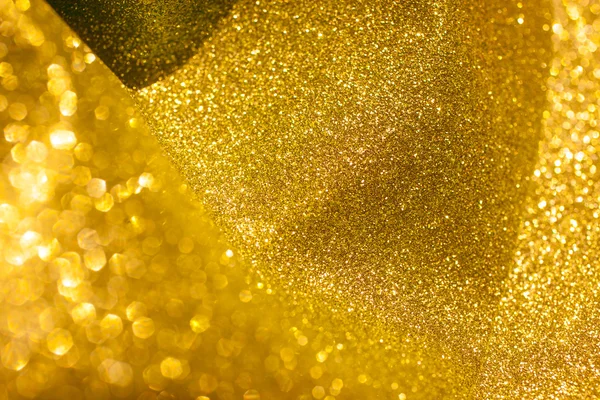 Guld glitter jul abstrakt bakgrund. Glänsande gyllene ljus — Stockfoto