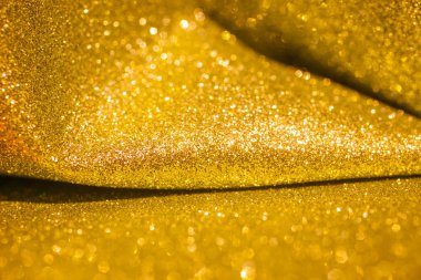 Altın glitter Noel arka plan. Parlak altın ışıkları