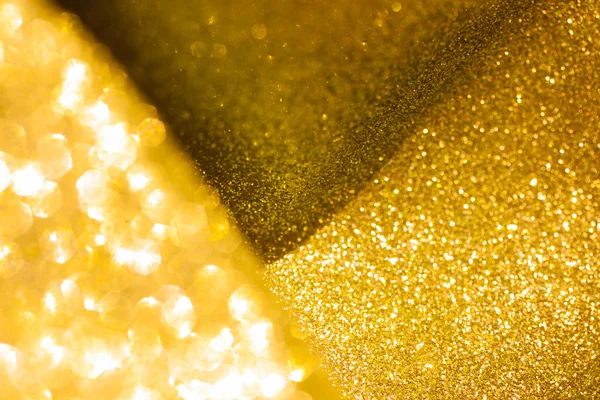 Goldener Glanz Weihnachten abstrakten Hintergrund. Goldglänzende Lichter — Stockfoto