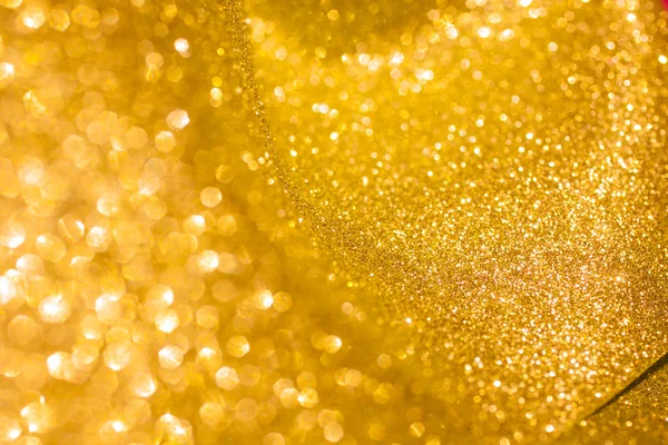 Gouden glitter Kerstmis abstracte achtergrond. Glanzende gouden lichten — Stockfoto