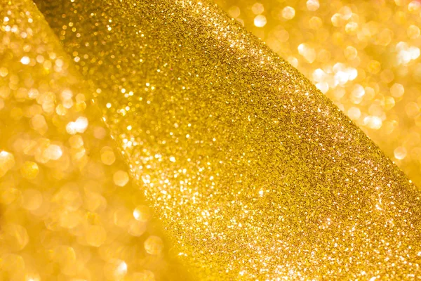 Złoty brokat Boże Narodzenie streszczenie tło. Błyszczący złoty światła — Zdjęcie stockowe