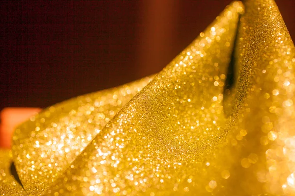 Gouden glitter Kerstmis abstracte achtergrond. Glanzende gouden lichten — Stockfoto