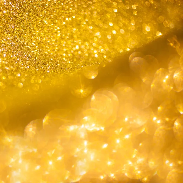 金色闪光圣诞抽象背景。闪亮的金色光芒 — 图库照片