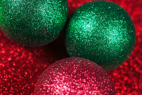 Christmas decorative balls on glitter shiny bokeh background