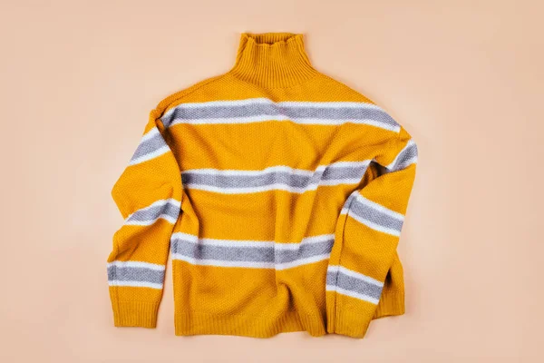 Trendy fall fashion flatlay with a yellow striped sweater — Stock Photo, Image