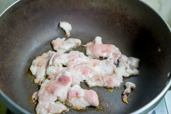 Carne de porco de fritura — Fotografia de Stock