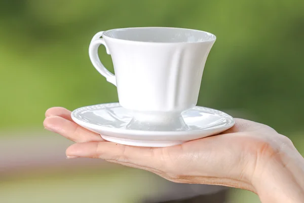Hand holding coffee — Stock Photo, Image