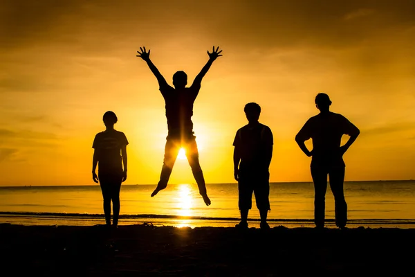 Jumping in sunset — Stock Photo, Image