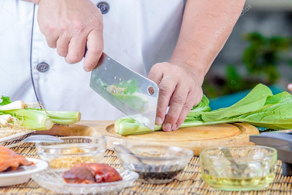 chef cutting kale 