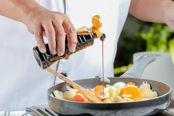 Chef seasoning — Stock Photo, Image