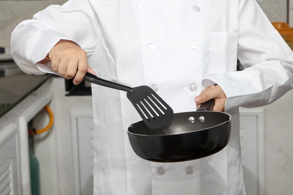 Chef holding pan — Stock Photo, Image