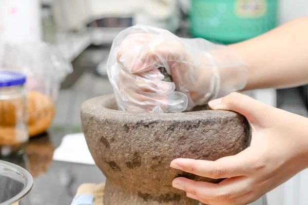 Pounding mortar — Stock Photo, Image