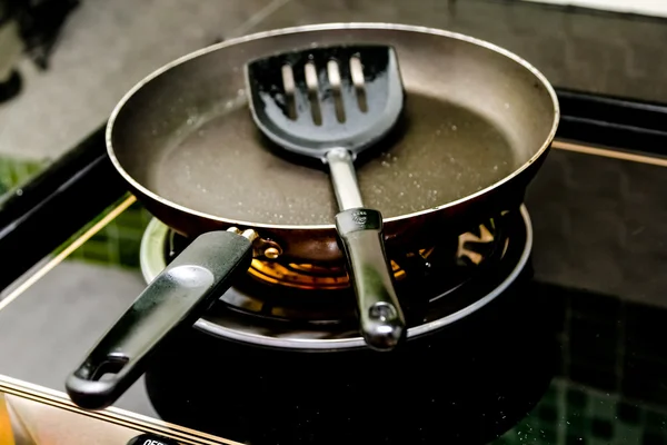 Pan on the gas stove — Stock Photo, Image