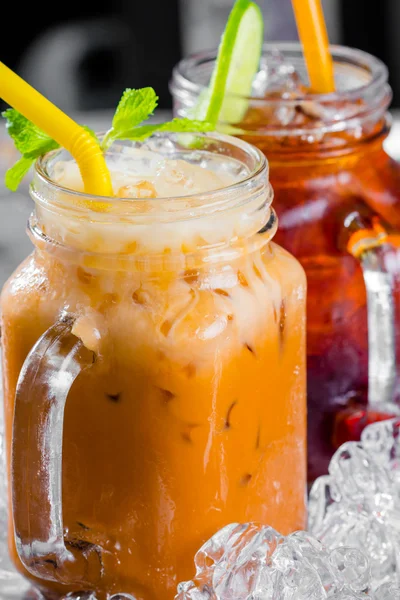 Isolated Front View of Thai Iced Lemon Tea in plastic cup with