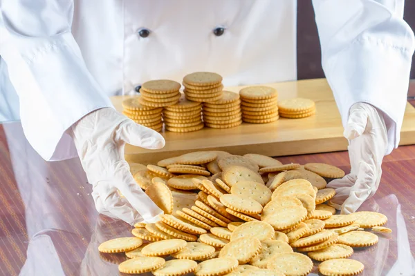 Chef hand crackers — Stock Photo, Image