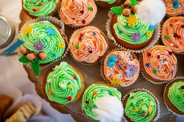 Multiple pastel colored cupcakes — Stock Photo, Image