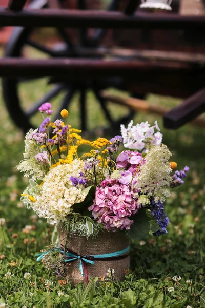 Bucket with wildflowers — Stock Photo, Image