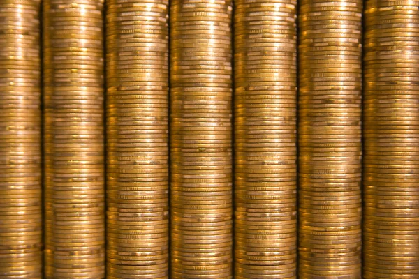 Golden piles of coins Royalty Free Stock Photos