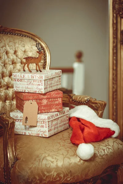 Night Christmas Gifts Stacked Gold Chair — Stock Photo, Image