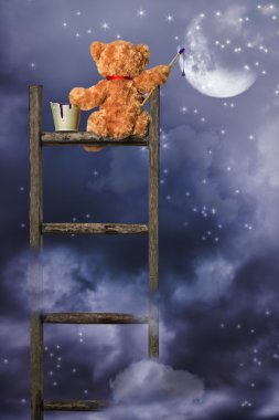 Teddy Painting At Night clipart