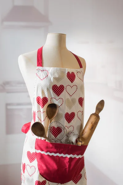 Avental de cozinha com utensílios — Fotografia de Stock