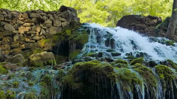Waterfall flows from Yusupov lake — Stock Footage Waterfall flows from Yusupov lake Stock Footage