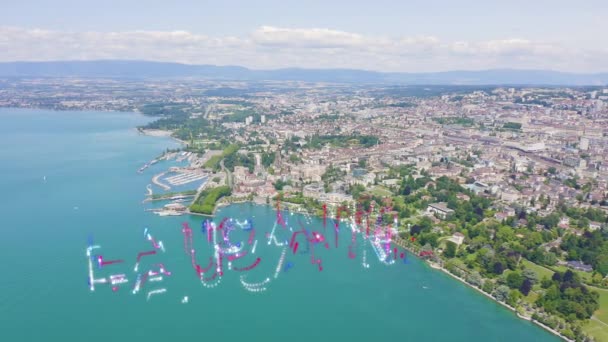 Lausanne, Schweiz. Flyg över den centrala delen av staden. Genèvesjöns kust. 4K — Stockvideo