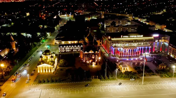Tula, Russia. Aerial view of the city at night. Assumption Cathedral. The text on the building translated into English: Tula - Hero City, Aerial View