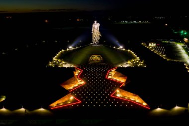 Rzhev, Russia - August 20, 2020: The Rzhev Memorial to the Soviet Soldier is dedicated to the memory of Soviet soldiers who died in battles near Rzhev in 1942-1943. Night time, Aerial View clipart