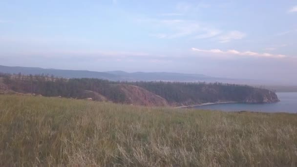 Russia, Lago Baikal, Isola di Olkhon, Tramonto su Small Sea Bay. 4K — Video Stock