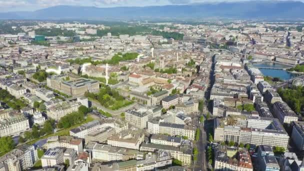 Genewa, Szwajcaria. Latanie nad centralną częścią miasta w godzinach porannych. 4K — Wideo stockowe