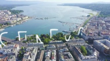 Cenevre, İsviçre. Şehrin merkez kısmının üzerinde uçuş. Geneva Gölü. 4K