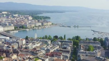 Dolly zoom. Cenevre, İsviçre. Şehrin merkez kısmının üzerinde uçuş. Geneva Gölü