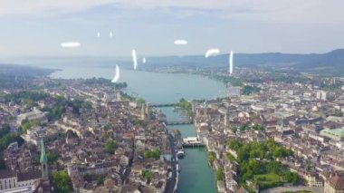 Zürih, İsviçre. Gökyüzünden şehrin panoraması. Zürih Gölü manzarası. Limmat Nehri Sona Eriş Alanı. 4K