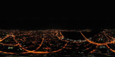 Astrakhan, Rusya. Geceleri şehrin havadan görünüşü. Sokak lambaları. Panorama 360