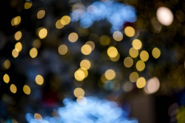 Genel amaç için renkli ışıklandırma efekti, odak kaybı veya bulanık resim ile bazı ışık yansımaları üzerinde Bokeh soyut arkaplan.