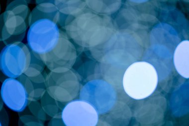 Genel amaç için renkli ışıklandırma efekti, odak kaybı veya bulanık resim ile bazı ışık yansımaları üzerinde Bokeh soyut arkaplan.