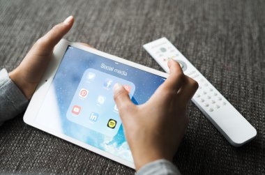 kid playing with ipad tablet