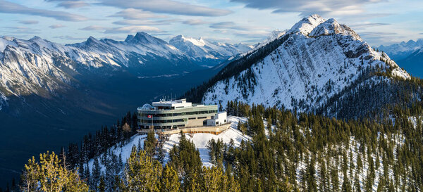 AB, Canada - OCT 31 2020 : Banff Gondola summit station. Wooden stairs and boardwalks along the summit. Banff National Park, Canadian Rockies.